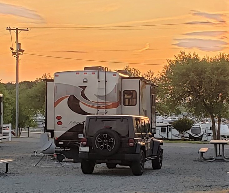 RV Full Timing campsite at sunset image.