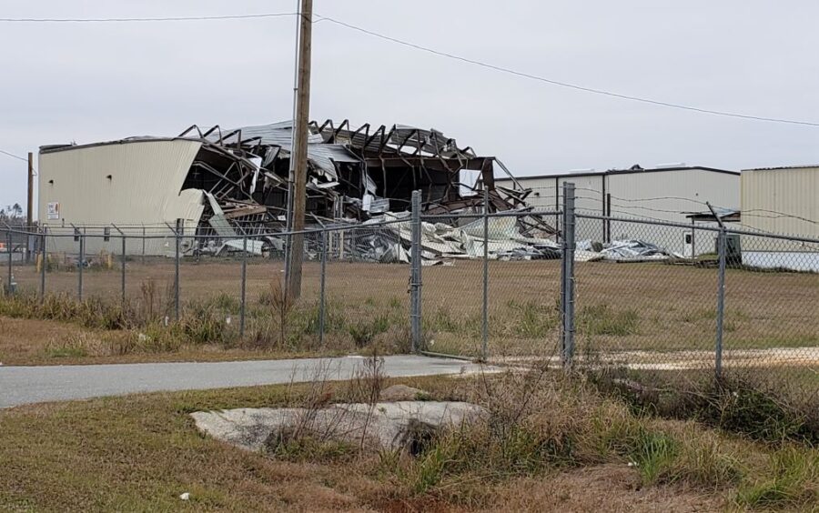 Natural disaster hurricane Michael in Florida caused extreme damage to this small aircraft hanger.