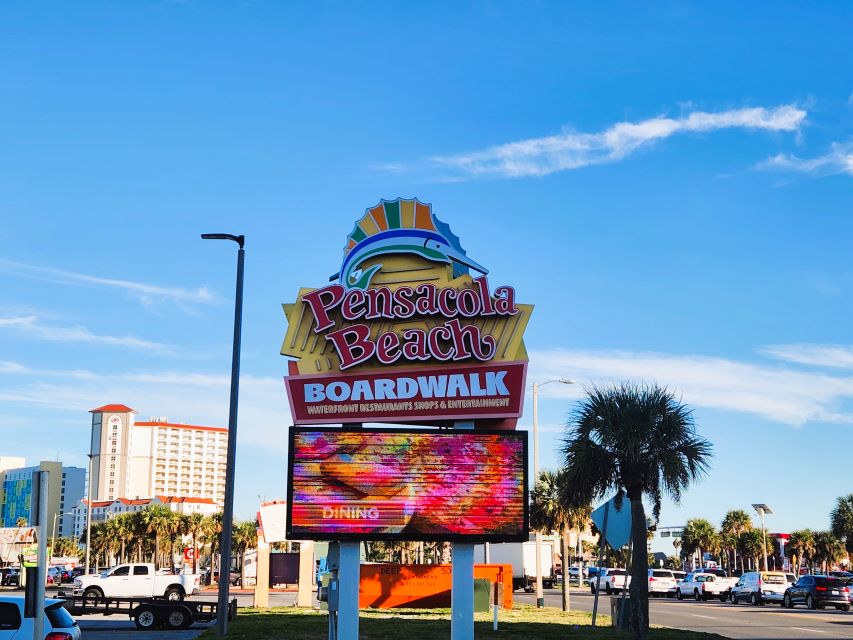 The Pensacola Beach Boardwalk sign on the main street in Pensacola Beach.